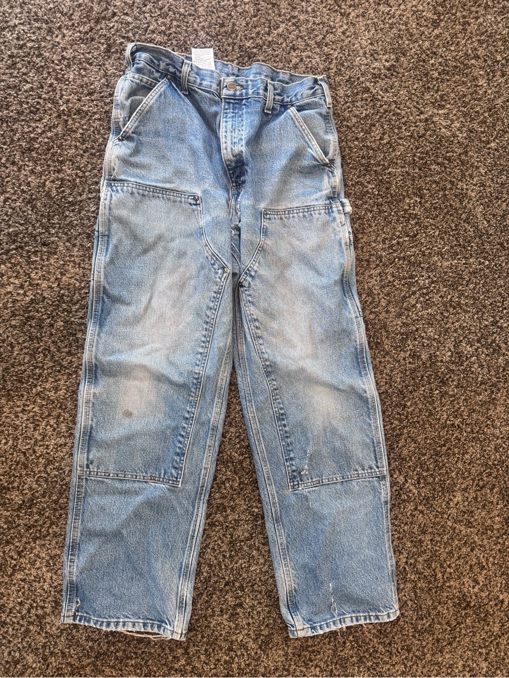 Men’s distressed Carhartt jeans